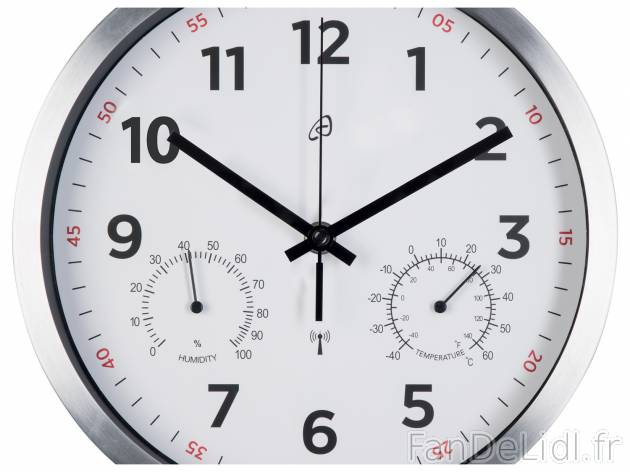 Horloge murale , le prix 7.99 € 
- Indication de l’heure, de la température ...