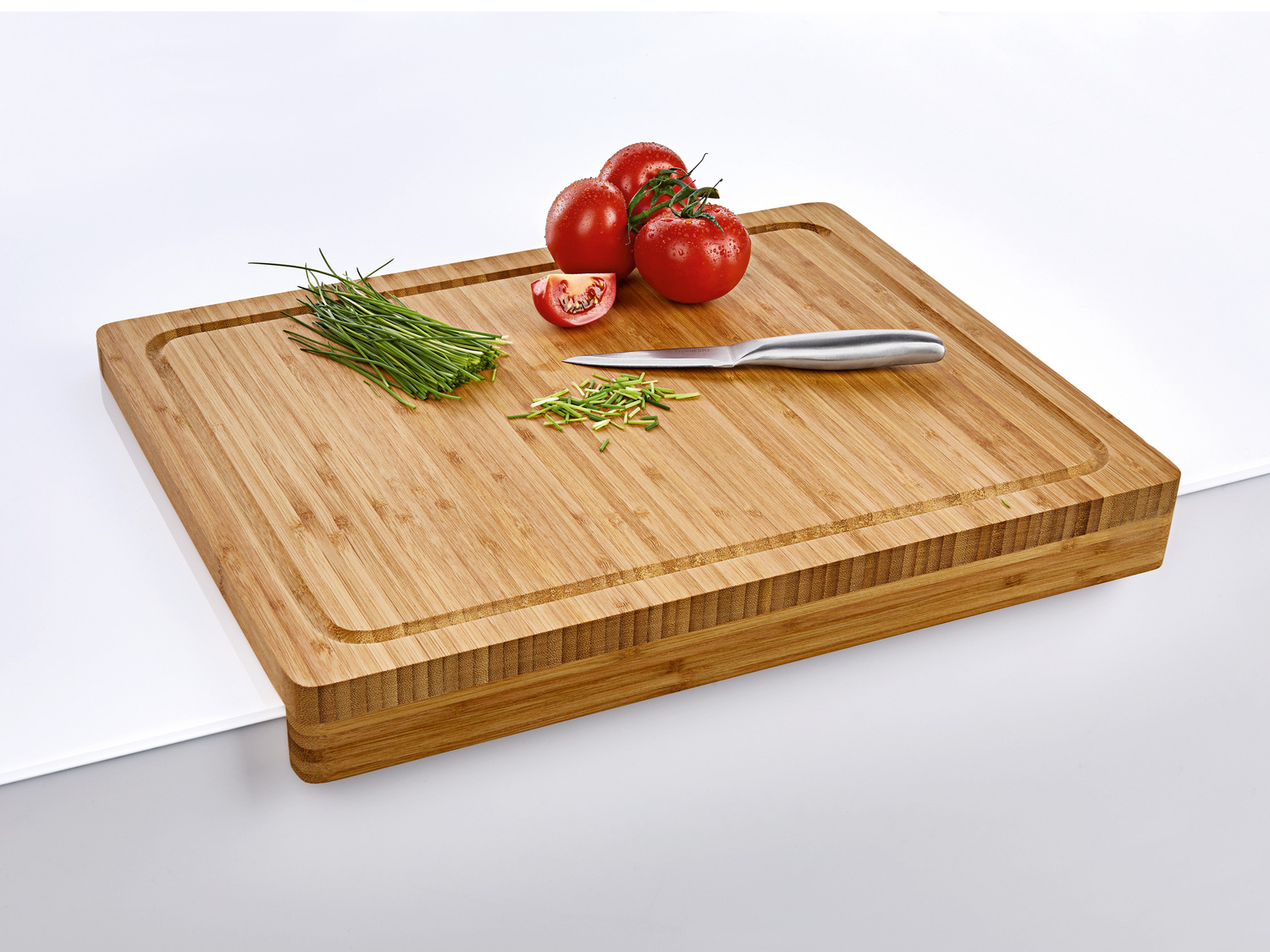 Planche à découper en bambou , le prix 6.99 €
- Plateau collecteur amovible ...